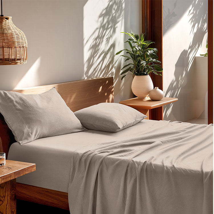 Tan Colored Microfiber sheets on a bed 