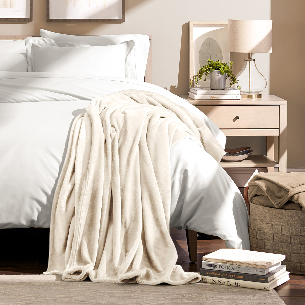 Microplush blanket draped over the corner of a bed