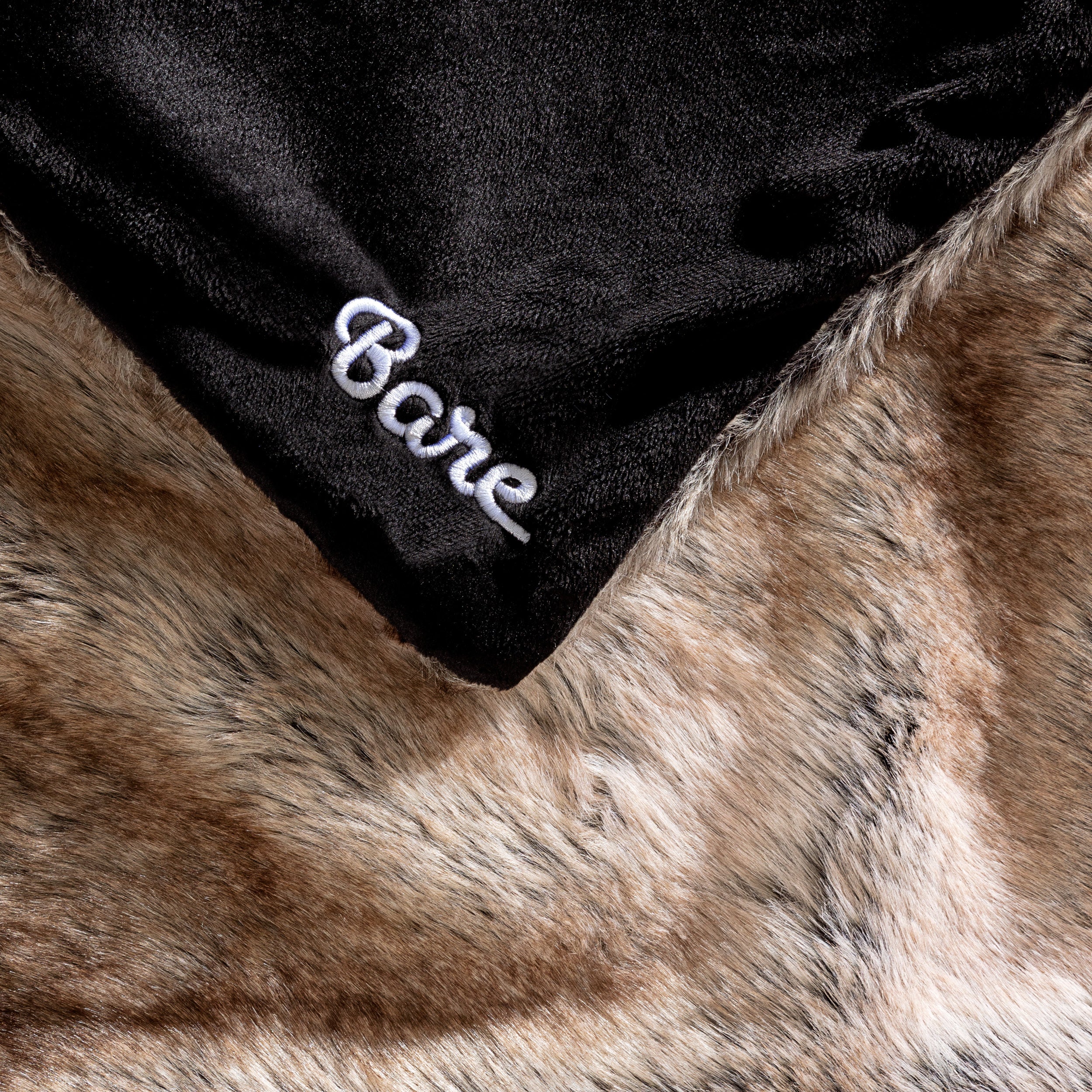 Faux fur blanket with Bare logo