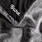 Faux fur blanket with Bare logo