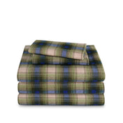 Stack of flannel sheets and pillowcases on a white background