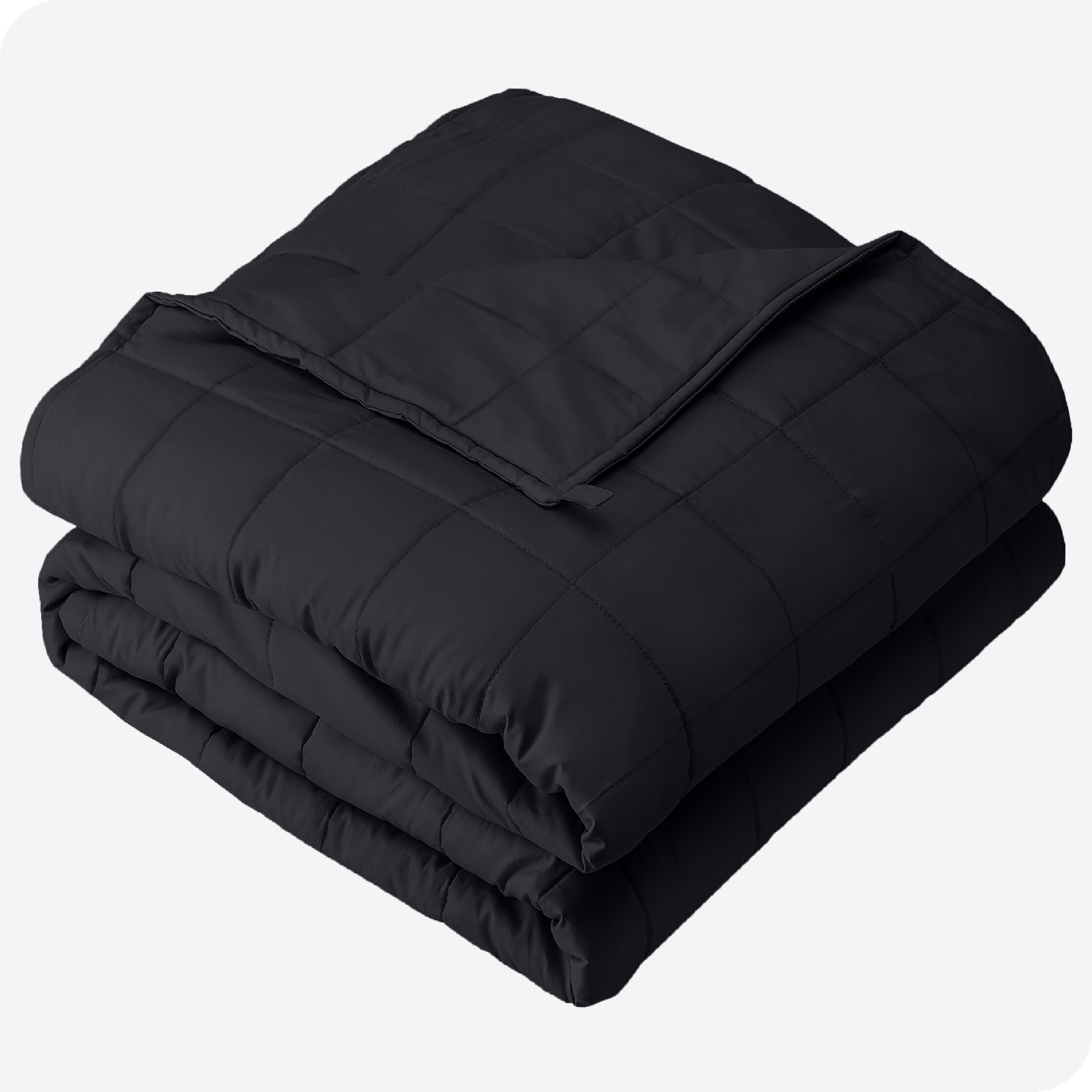 A folded cotton weighted blanket with a white background.