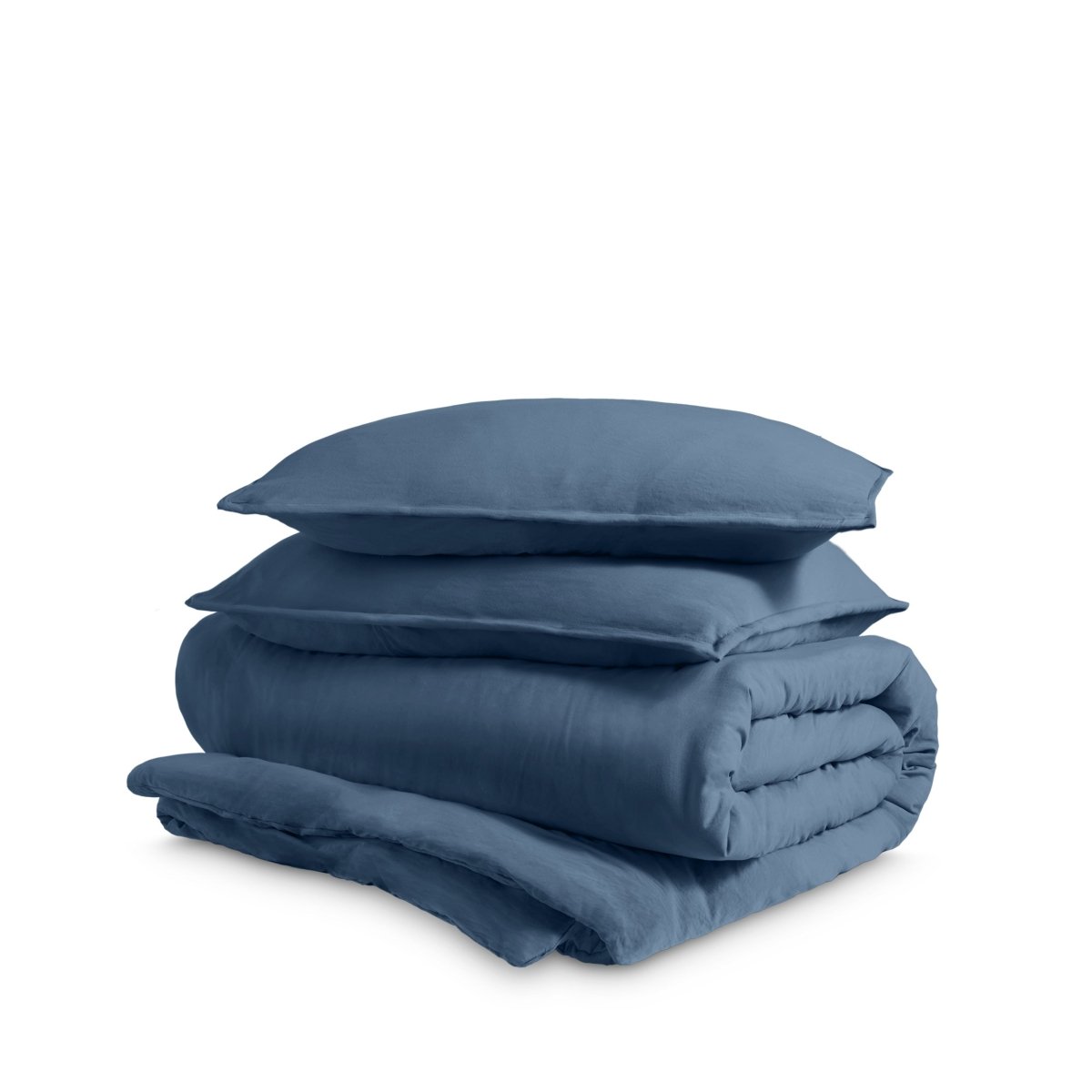 Washed duvet cover and sham set folded and stacked on a white background