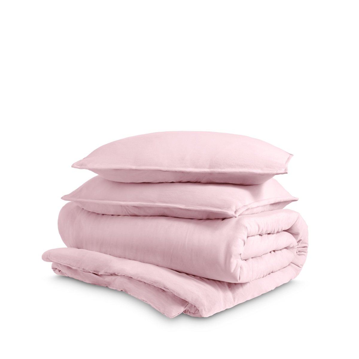 Washed duvet cover and sham set folded and stacked on a white background
