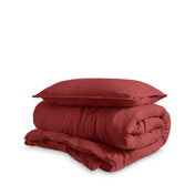 Washed duvet cover and sham set folded and stacked on a white background