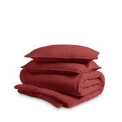 Washed duvet cover and sham set folded and stacked on a white background