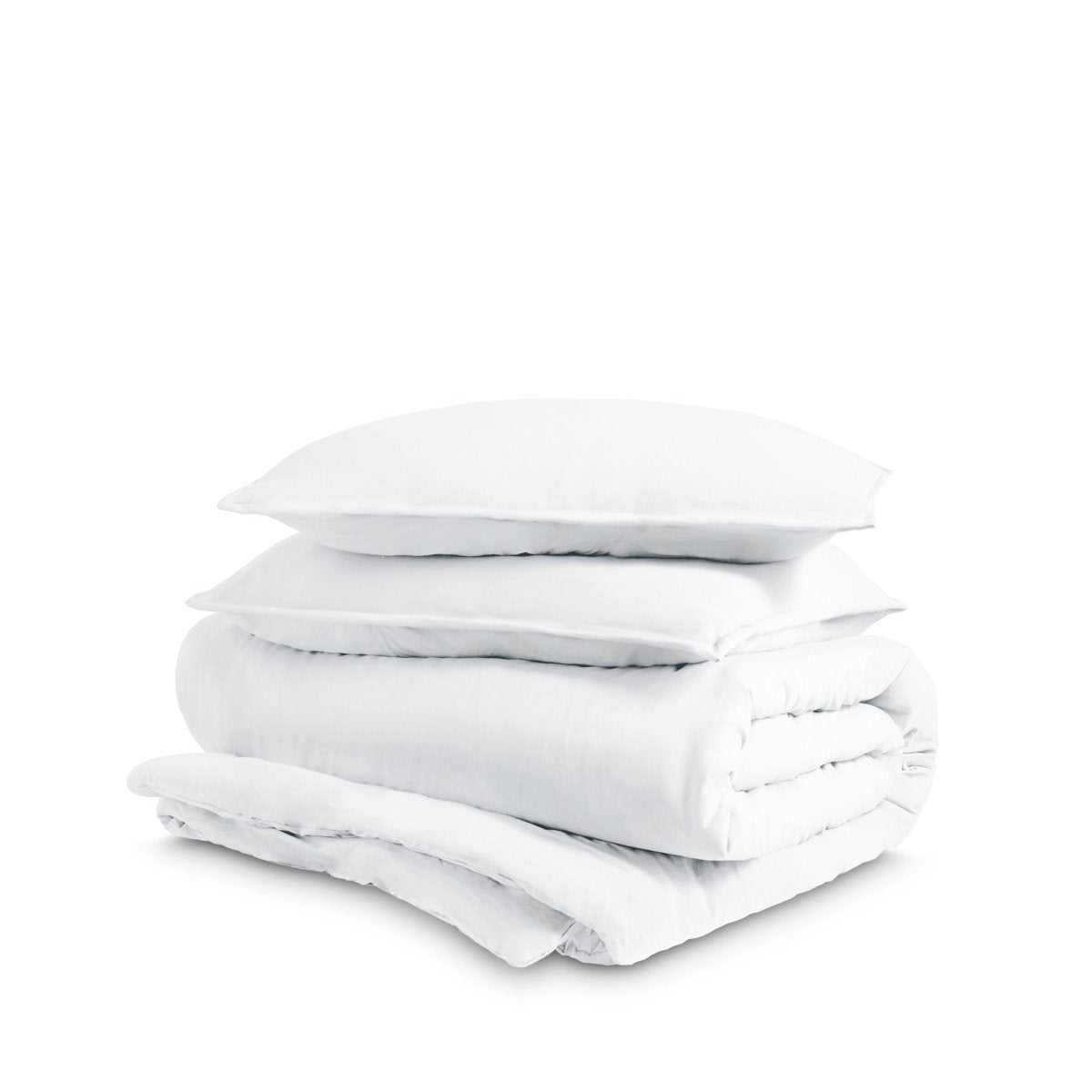 Washed duvet cover and sham set folded and stacked on a white background