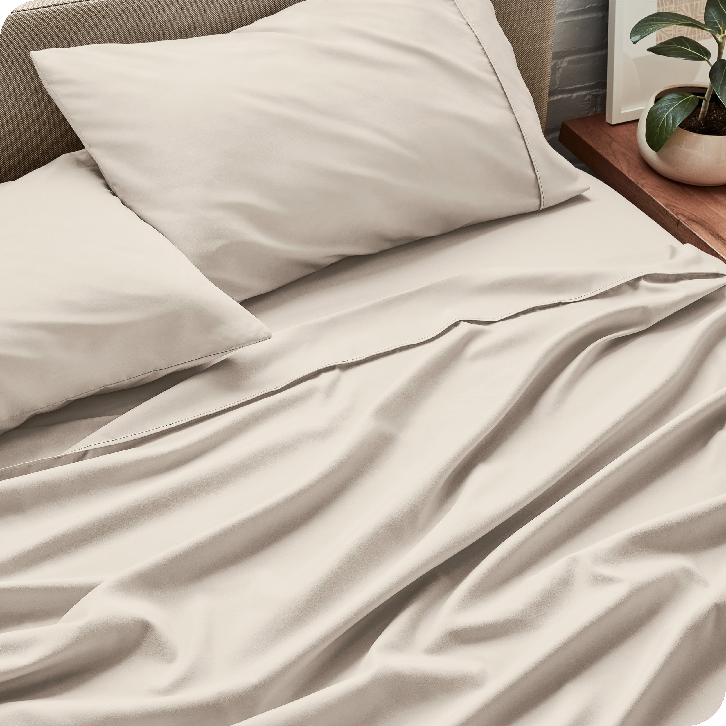 Close up of a microfiber sheet set on a bed