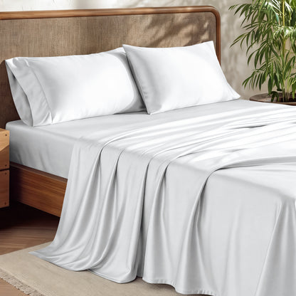 Bamboo sheets draped over the edge of a bed.