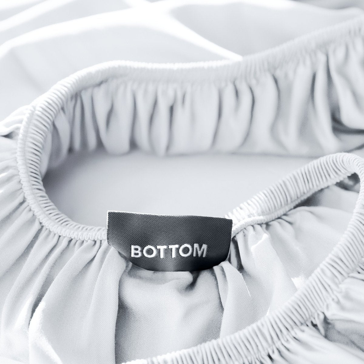 Close up of the tag on the fitted bamboo sheet.