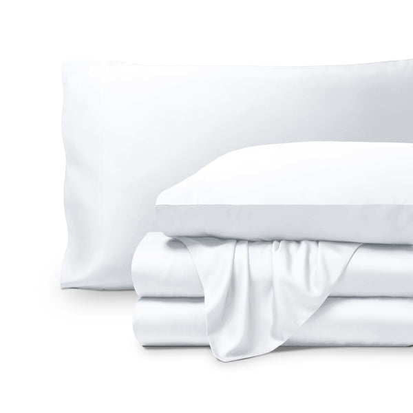 Bamboo pillowcases and sheets set on a white background