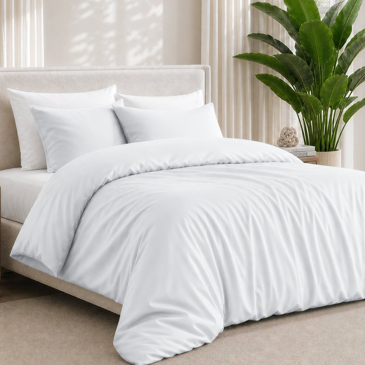 Bamboo bedding set on a bed in a bedroom with a plant in the corner.