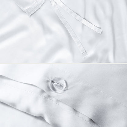 Close-up of the corner ties and button closure on a duvet cover