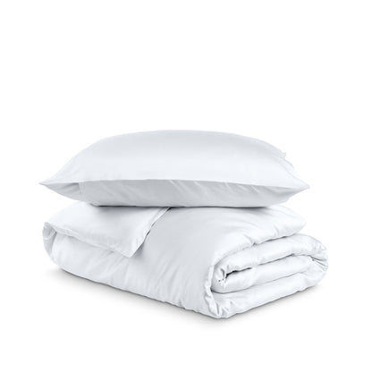 Bedding set with duvet cover and pillow shams on a white background