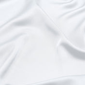 Close-up of white fabric with folds