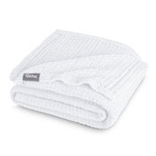 A cotton waffle blanket folded