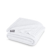A cotton waffle blanket folded