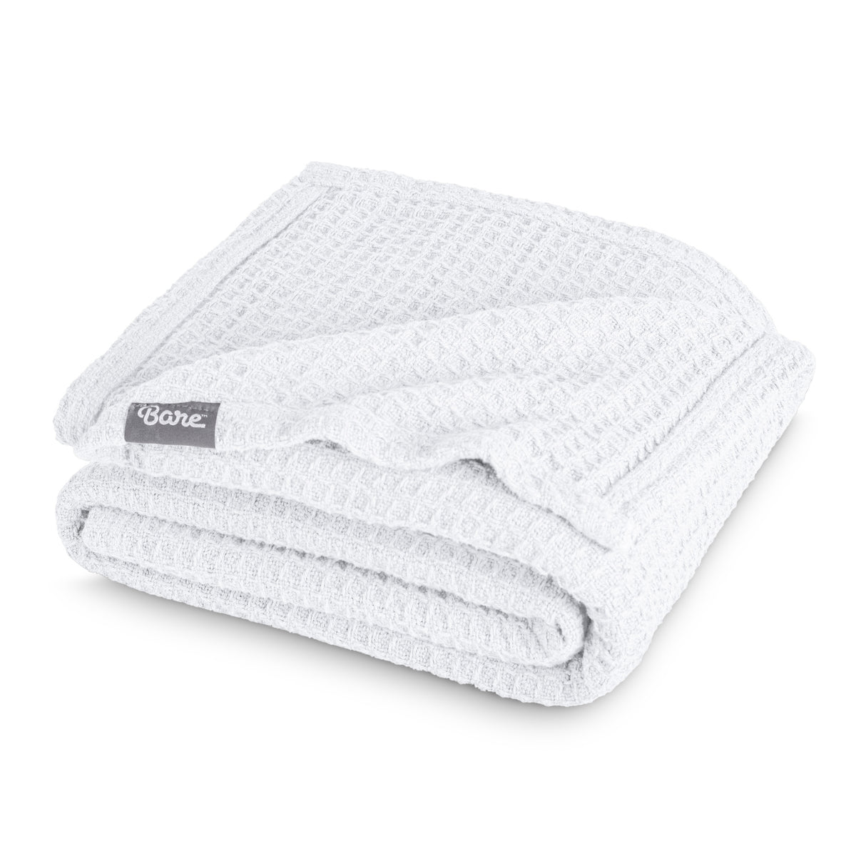 Folded blanket with a Bare Home label on a white background
