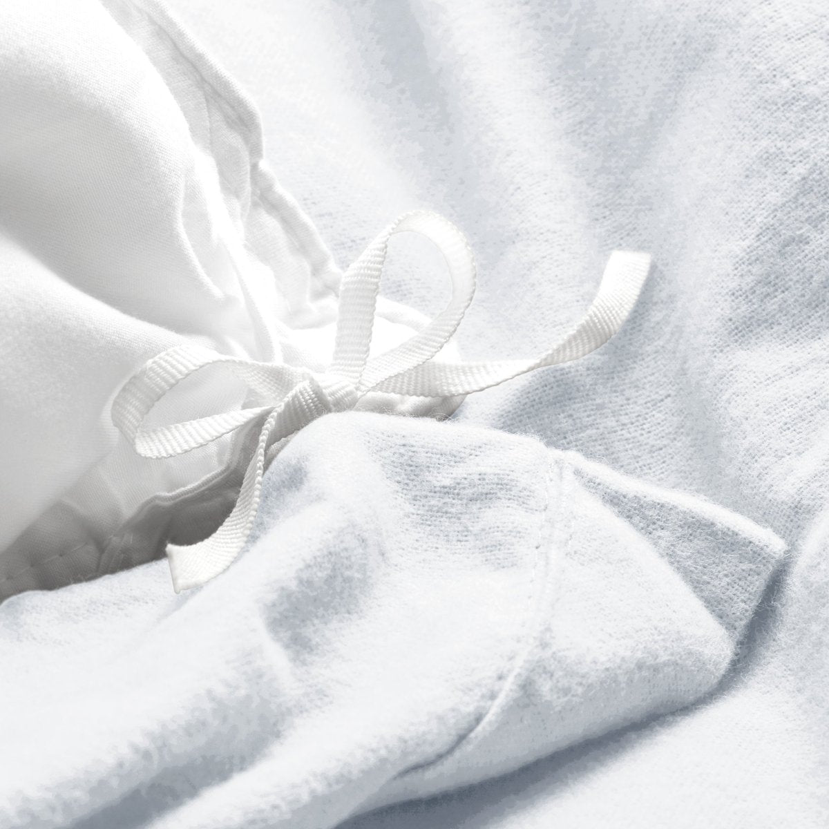 Close-up of the ties on a flannel duvet cover