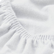 Close up of the elastic portion of a flannel fitted sheet