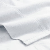 Close-up of flannel fabric with a focus on texture and color.