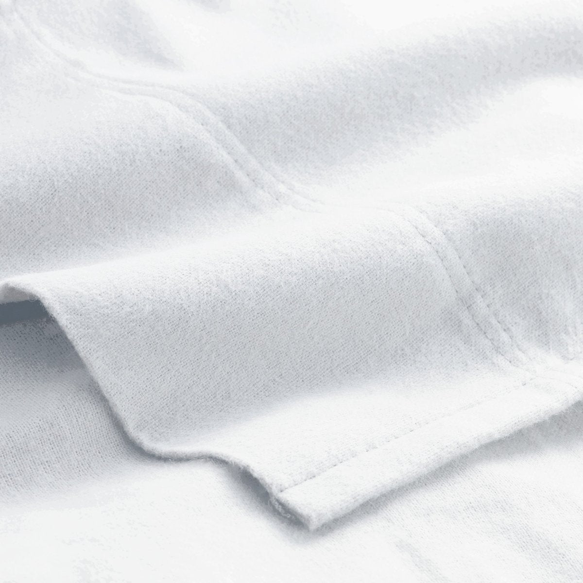 Close-up of flannel fabric with a focus on texture and color.