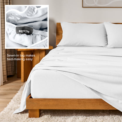 Flannel sheets on a with an inset of a sewn-in tag reading BOTTOM