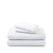 Cotton flannel sheet set folded and stacked on a white background