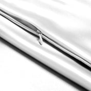 Close-up of a satin pillowcase with a zipper