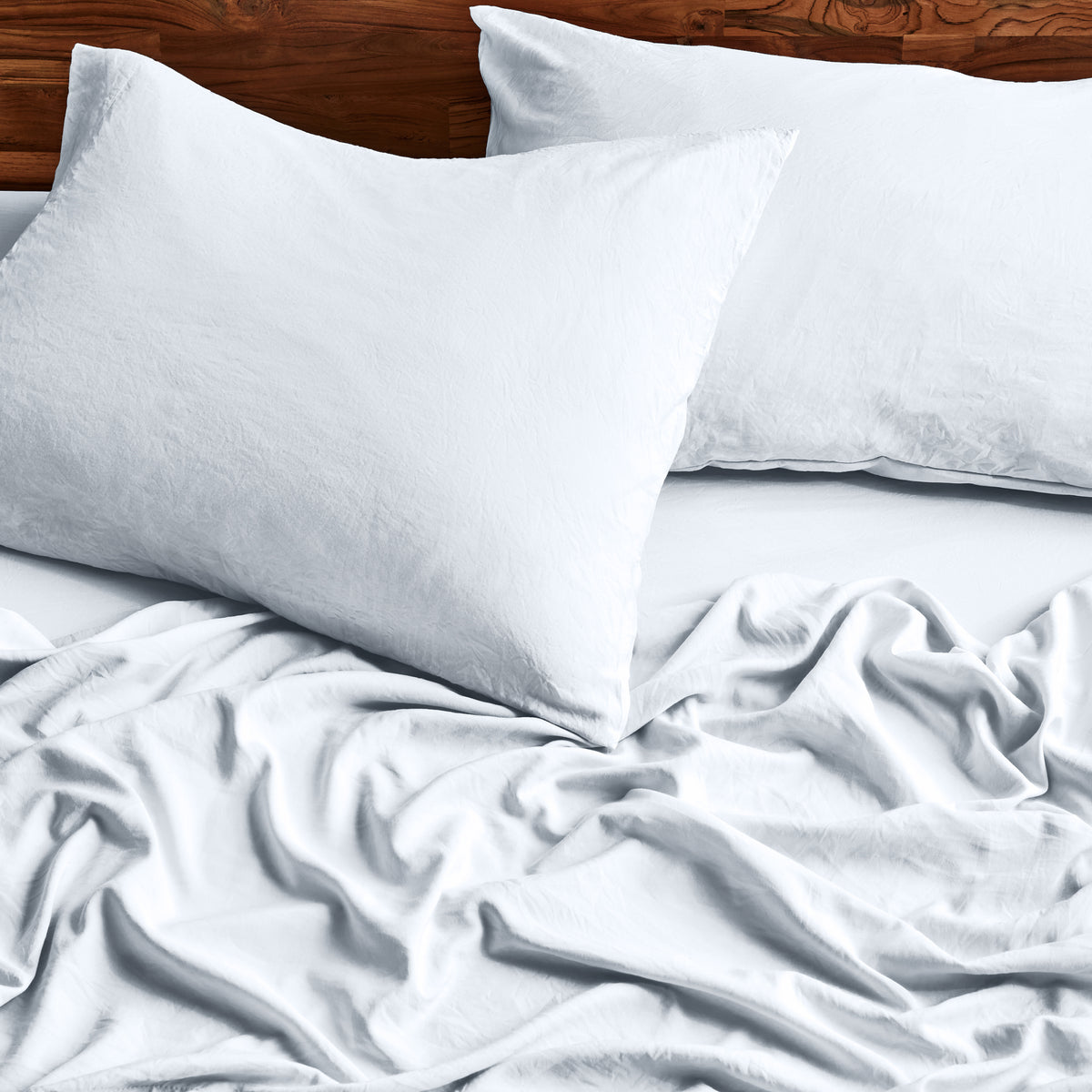 Close-up of sheets and pillowcases on a bed