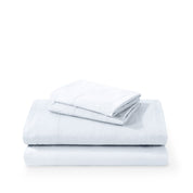 Washed sheet set folded and stacked