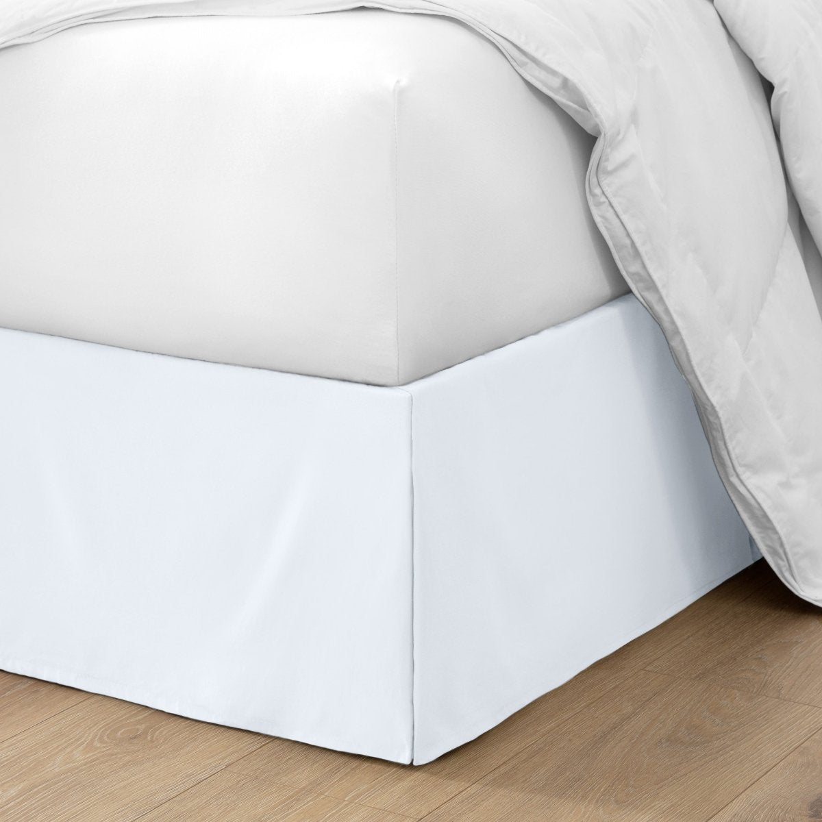 Ultra soft bed skirt on a bed with white bedding.