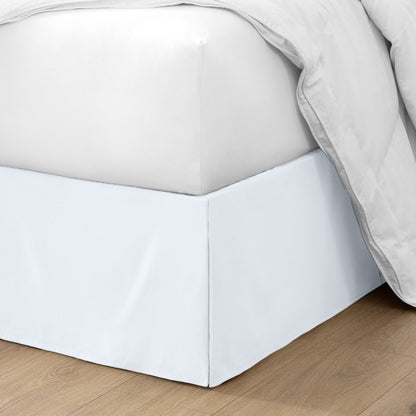 Ultra soft bed skirt on a bed with white bedding.
