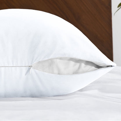 Body pillowcase with a zipper closure on a bed with a wooden headboard