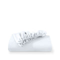 A deep pocket fitted sheet folded on a white background