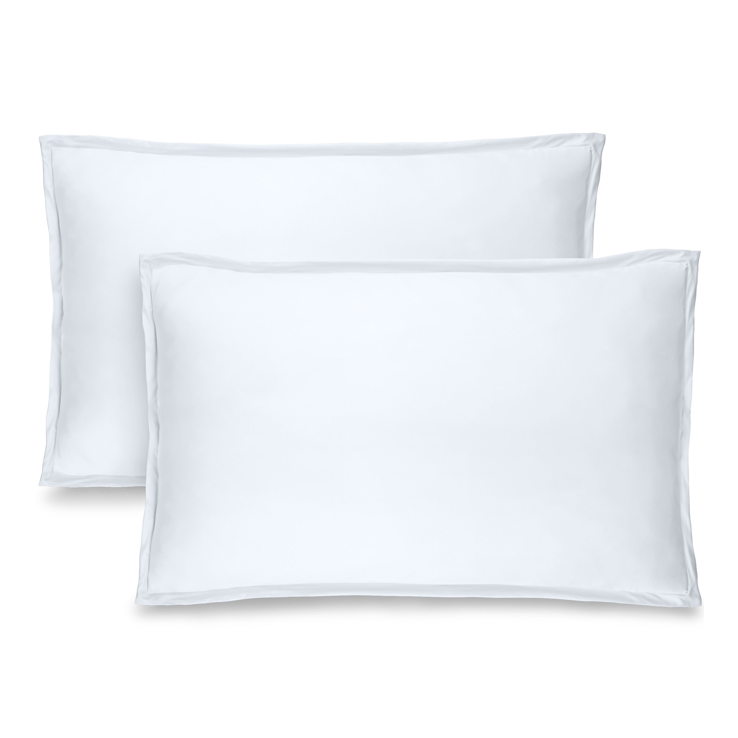 Two white pillow shams on pillows standing up with one behind the other