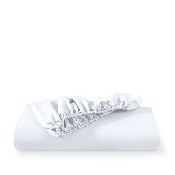 Microfiber fitted sheet folded with a white background