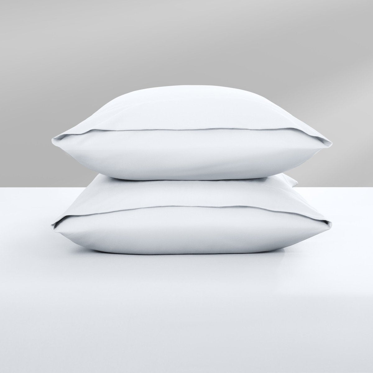 Two pillowcases on top of a bed