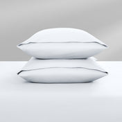 Two pillowcases on top of a bed