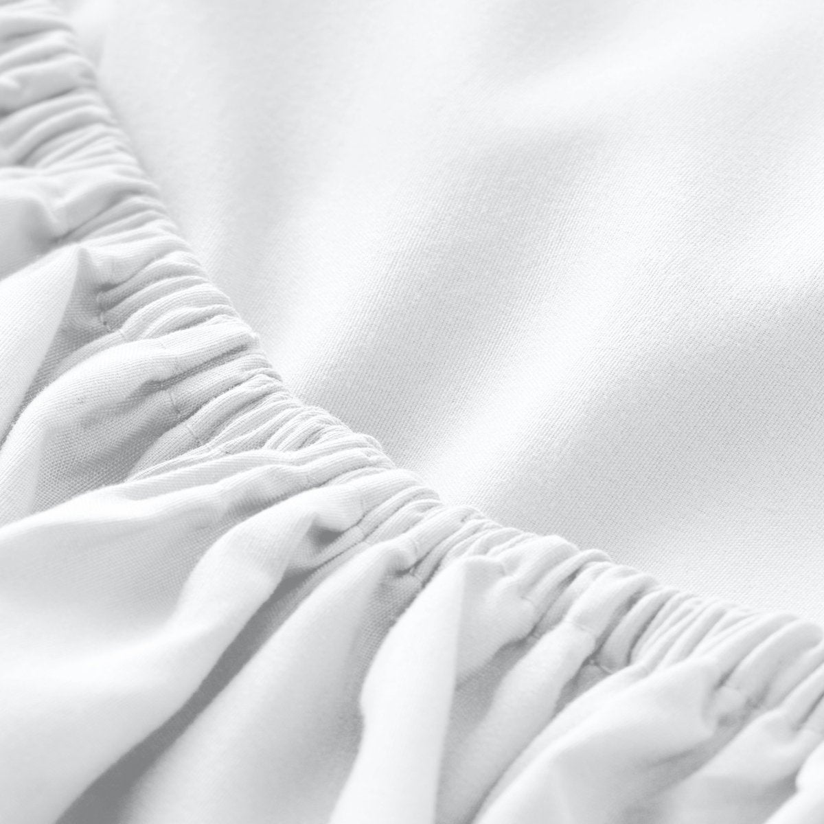 Close-up of elastic on a fitted sheet.