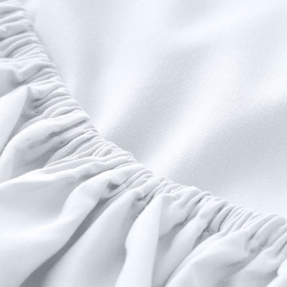 A close-up of a fitted sheet with elasticized edge.