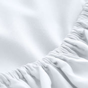 Close-up of fitted sheet showing the all around elastic