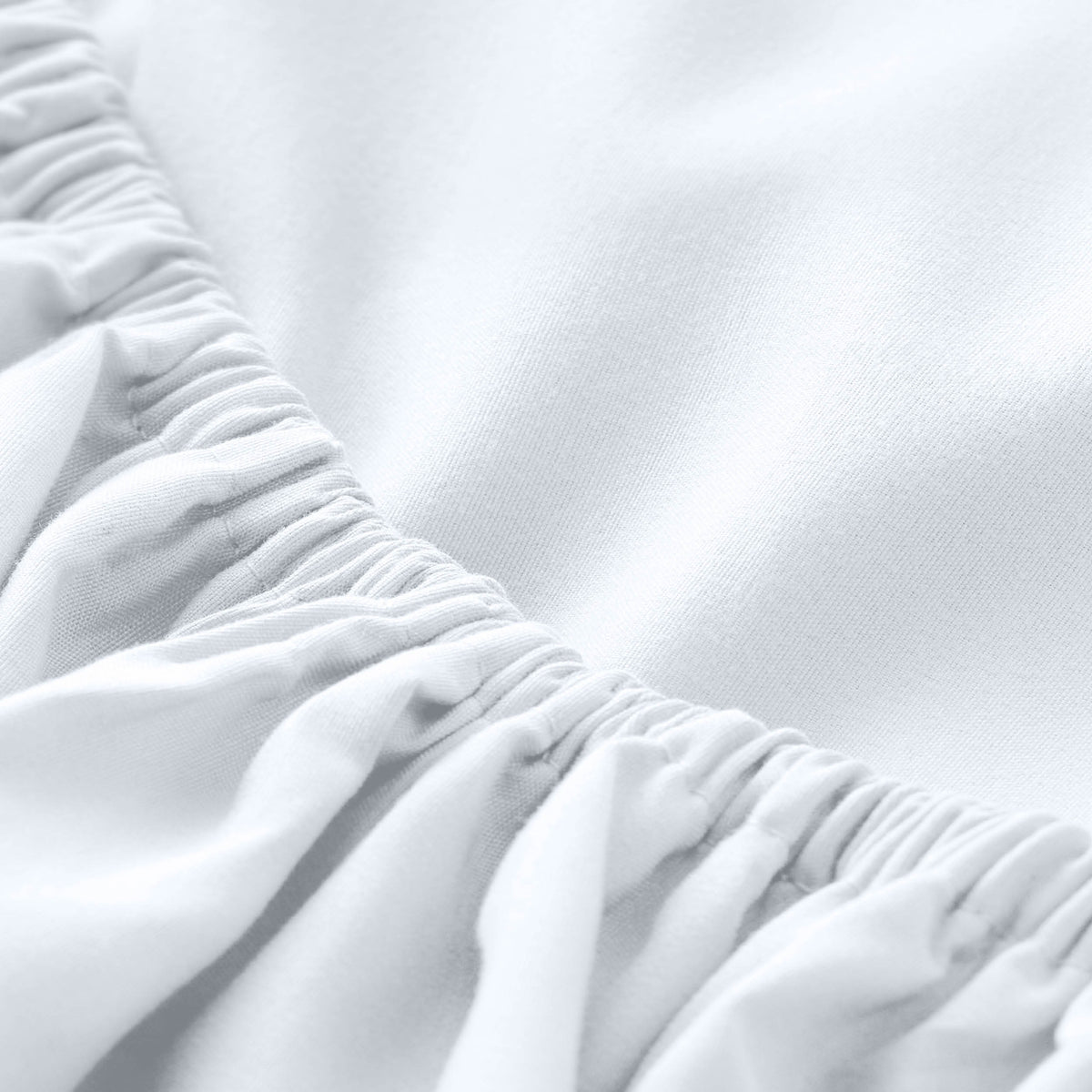 Close-up of fitted sheet with all around elastic