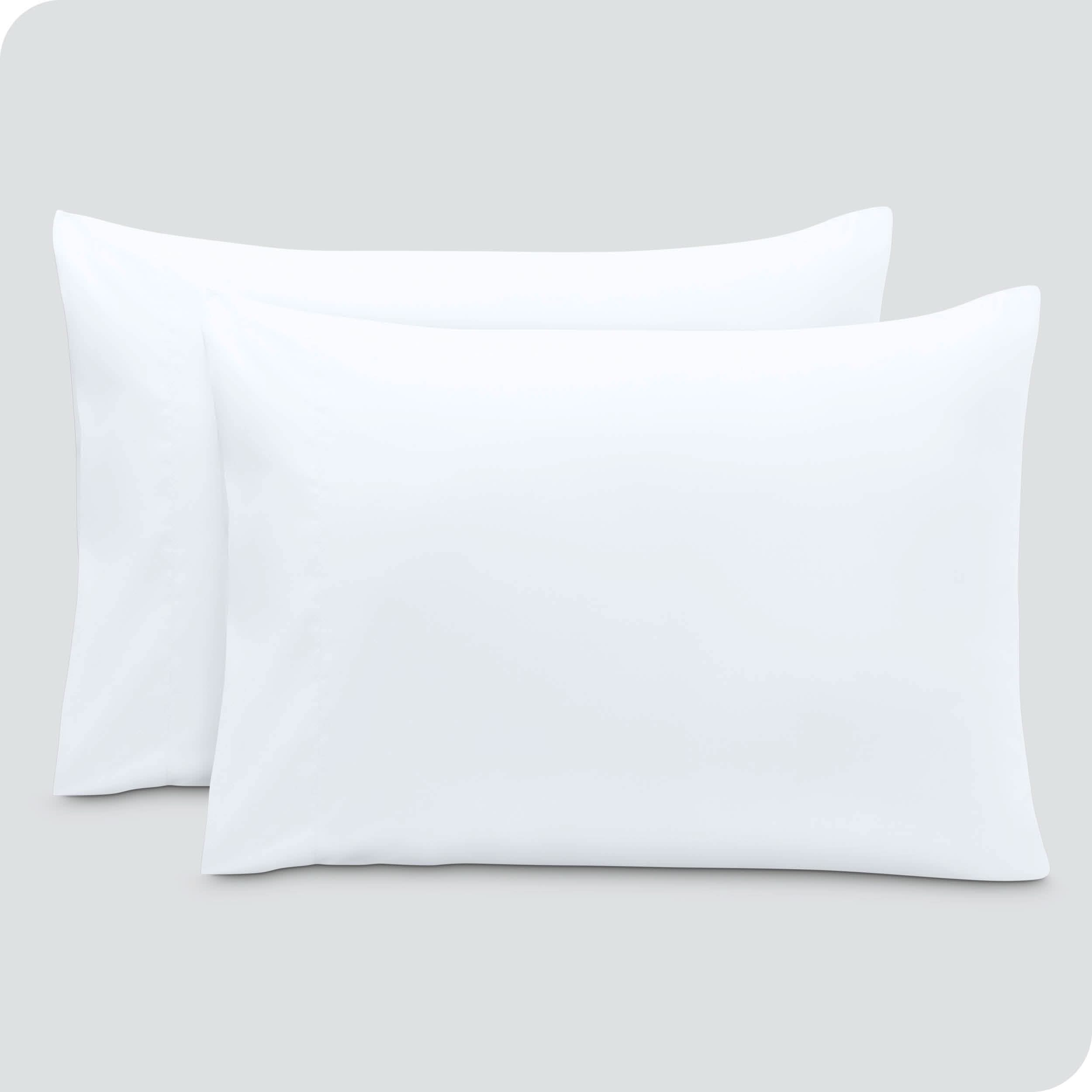 2 pillowcases on pillows