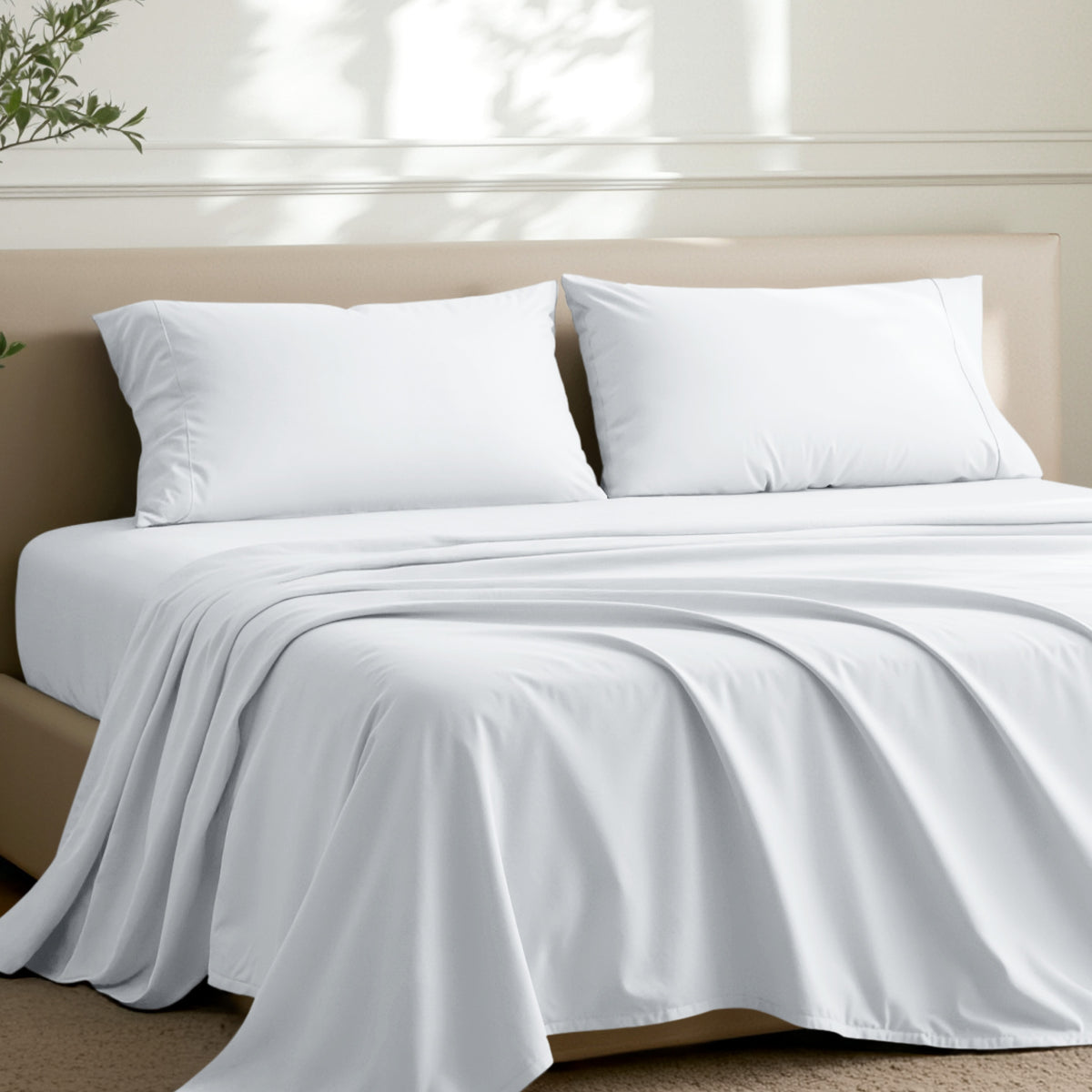 2 pillowcases on pillows on a nicely made bed