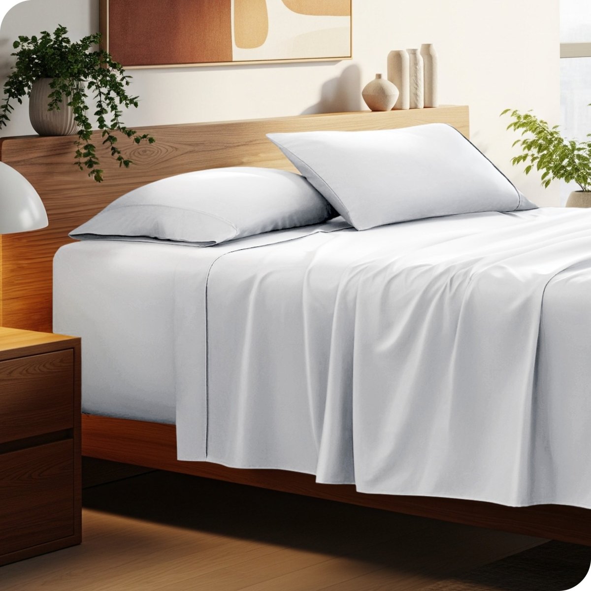 Bed with microfiber bedding and wooden headboard in a bedroom setting