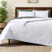 A comforter set on a bed
