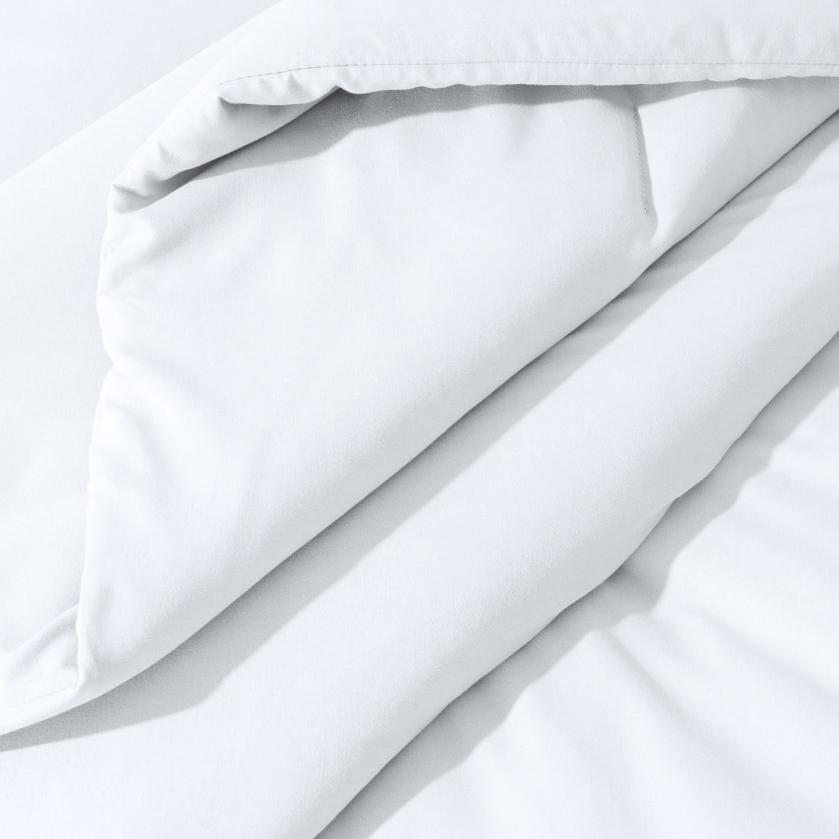 Close-up of comforter on a bed