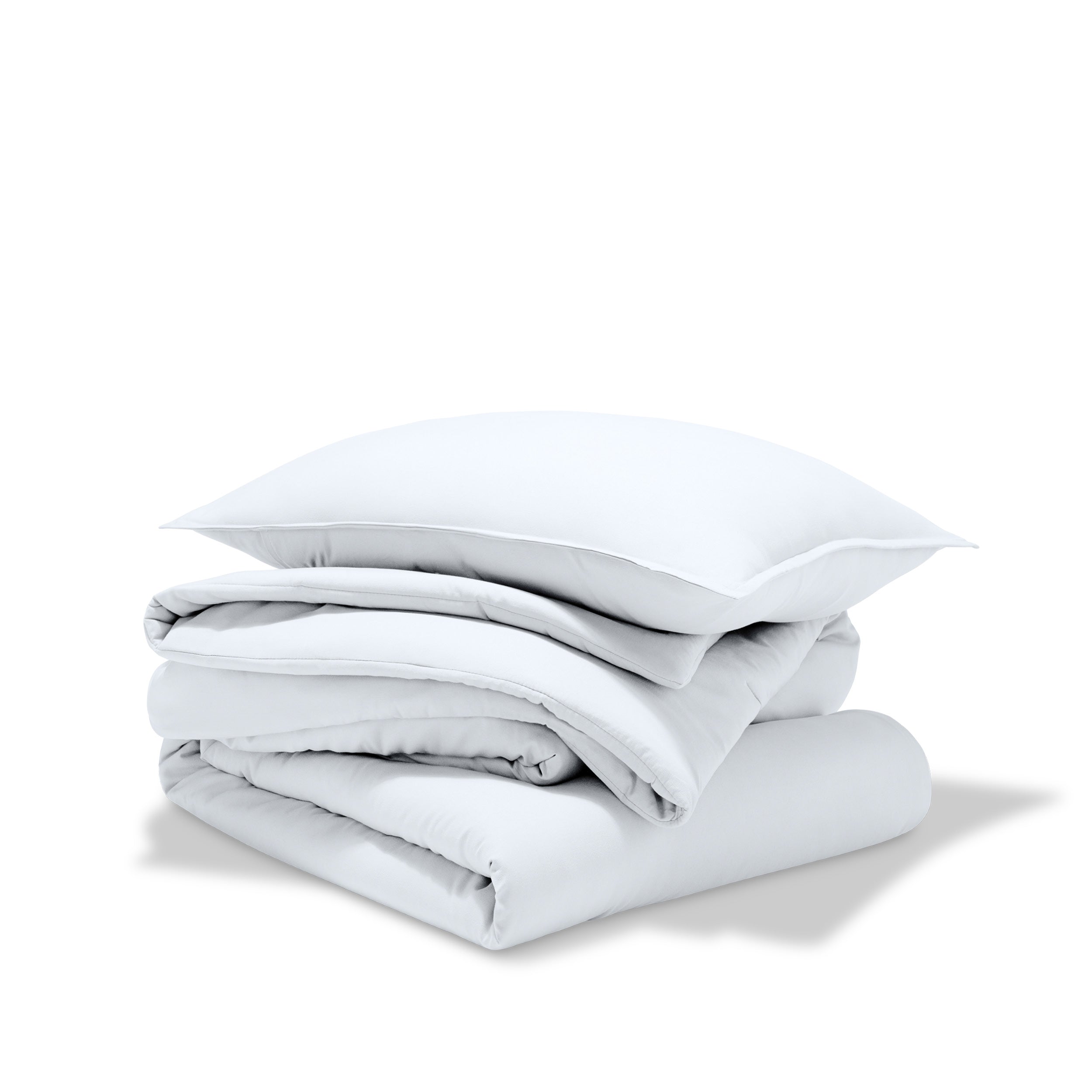A comforter set folded and stacked