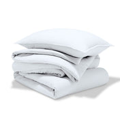 A comforter set folded and stacked